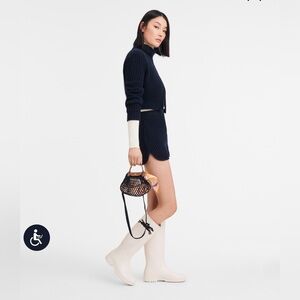 Pre Owned Longchamp LE PLIAGE FILET XS MESH BAG
Pink - Canvas